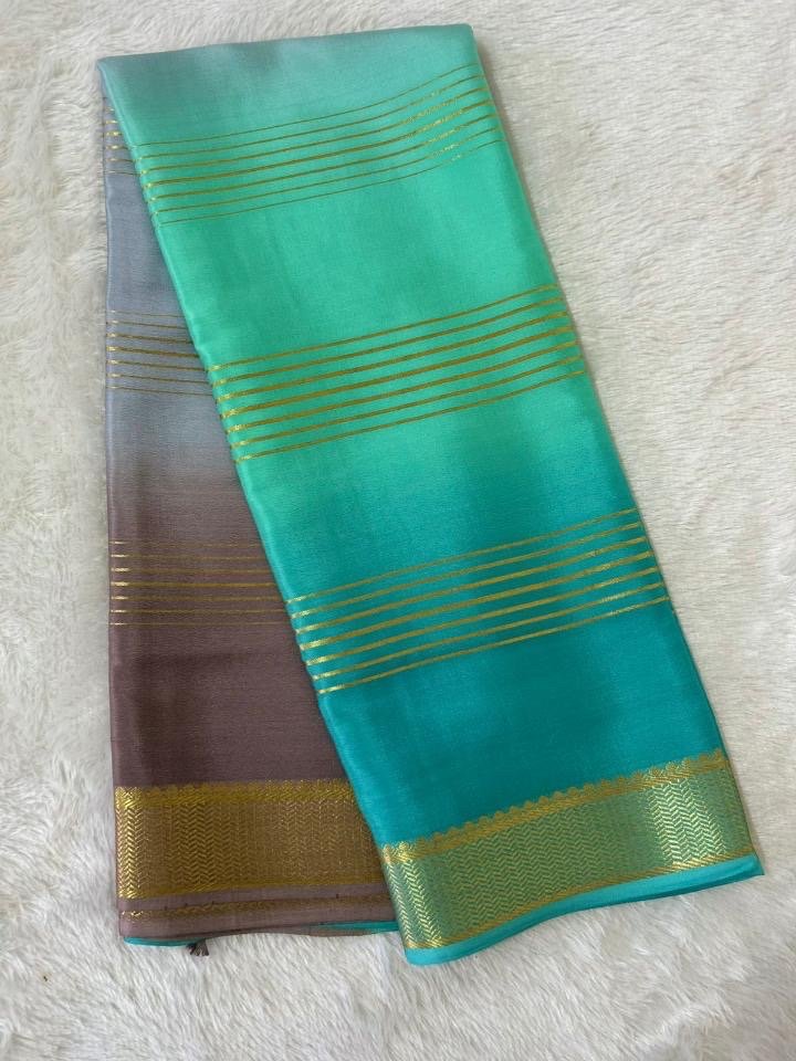 Trisha Charm — Grey-Brown To Turquoise Pure Crepe Silk Saree